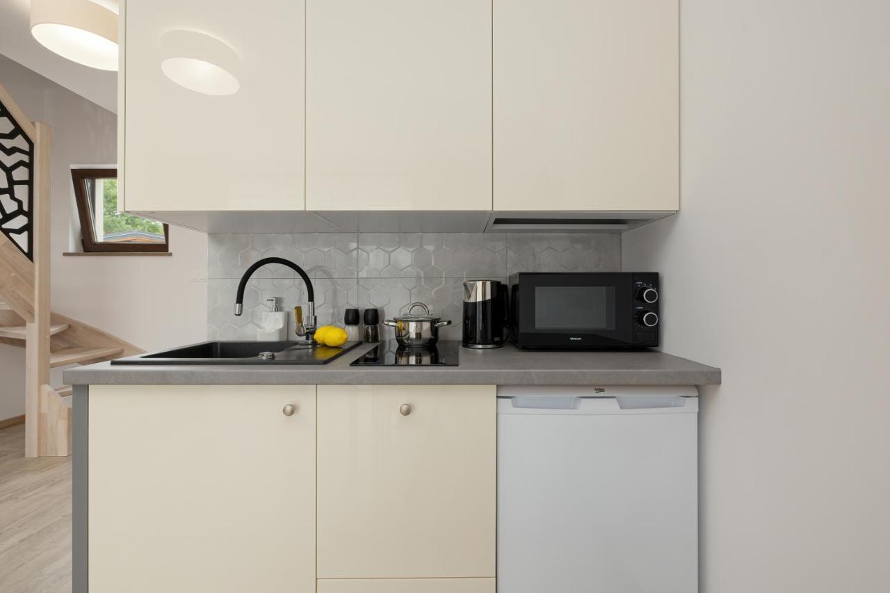 Appartement Sloneczne Tarasy à Pustkowo Extérieur photo